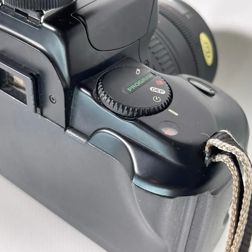 Canon E05 750 35mm camera and Nikon Fun touch 2 35mm camera